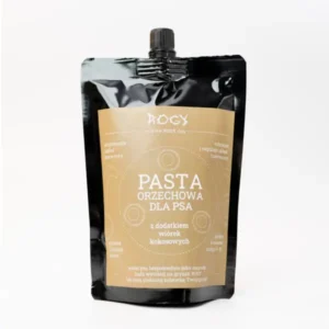 Pasta orzechowa z dodatkiem wiórków kokosowych 300g dla Psa. W czarnej torebce z brązową etykietą. Torebka zamykana na korek