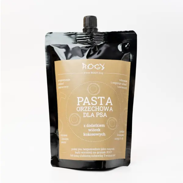 Pasta orzechowa z dodatkiem wiórków kokosowych 300g dla Psa. W czarnej torebce z brązową etykietą. Torebka zamykana na korek